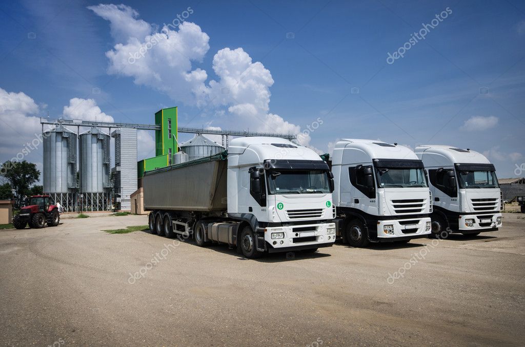 depositphotos_28006889-stock-photo-white-trucks-parked